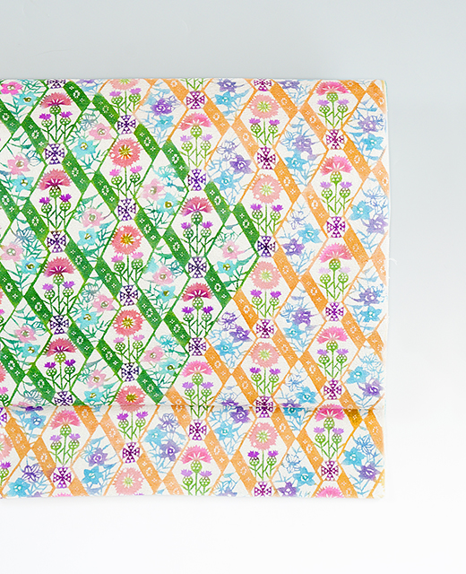 岩井香楠子 制作：型絵染め九寸名古屋帯『王妃の庭』